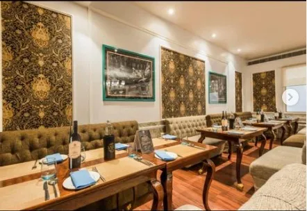 wallpaper installed at punjabgrill Designed by SONI AGGARWAL Ambience Mall