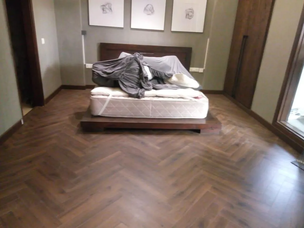 Herringbone wooden flooring installed